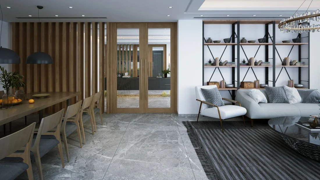 Open living and dining area with gray seating and wooden finishes