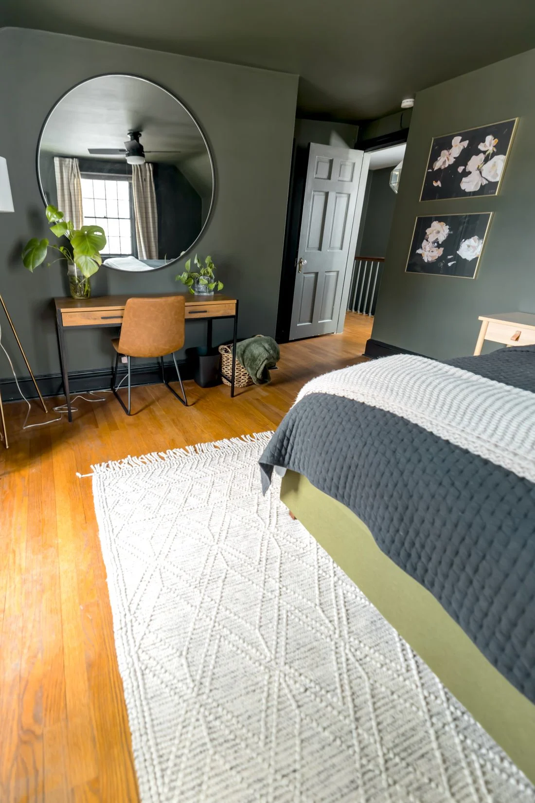 Bedroom with a dressing table, mirror, and chair