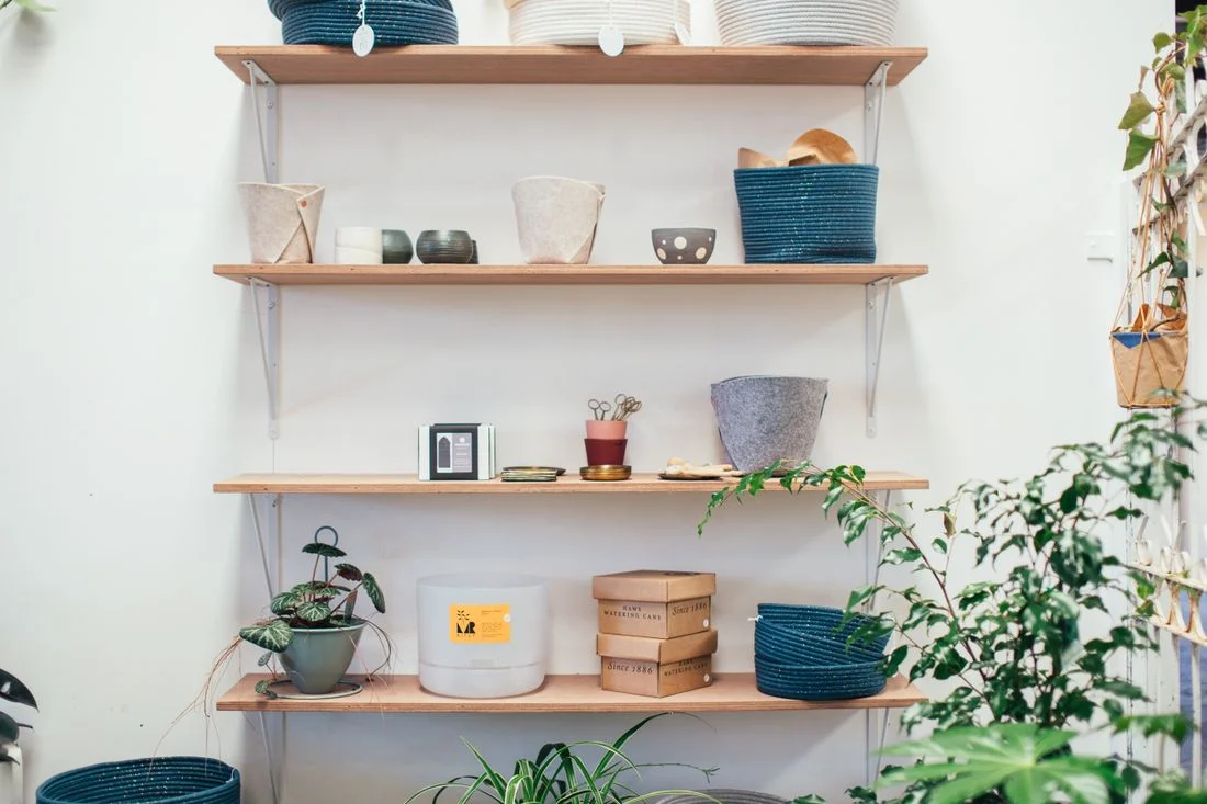 Wooden shelves with boxes and household items