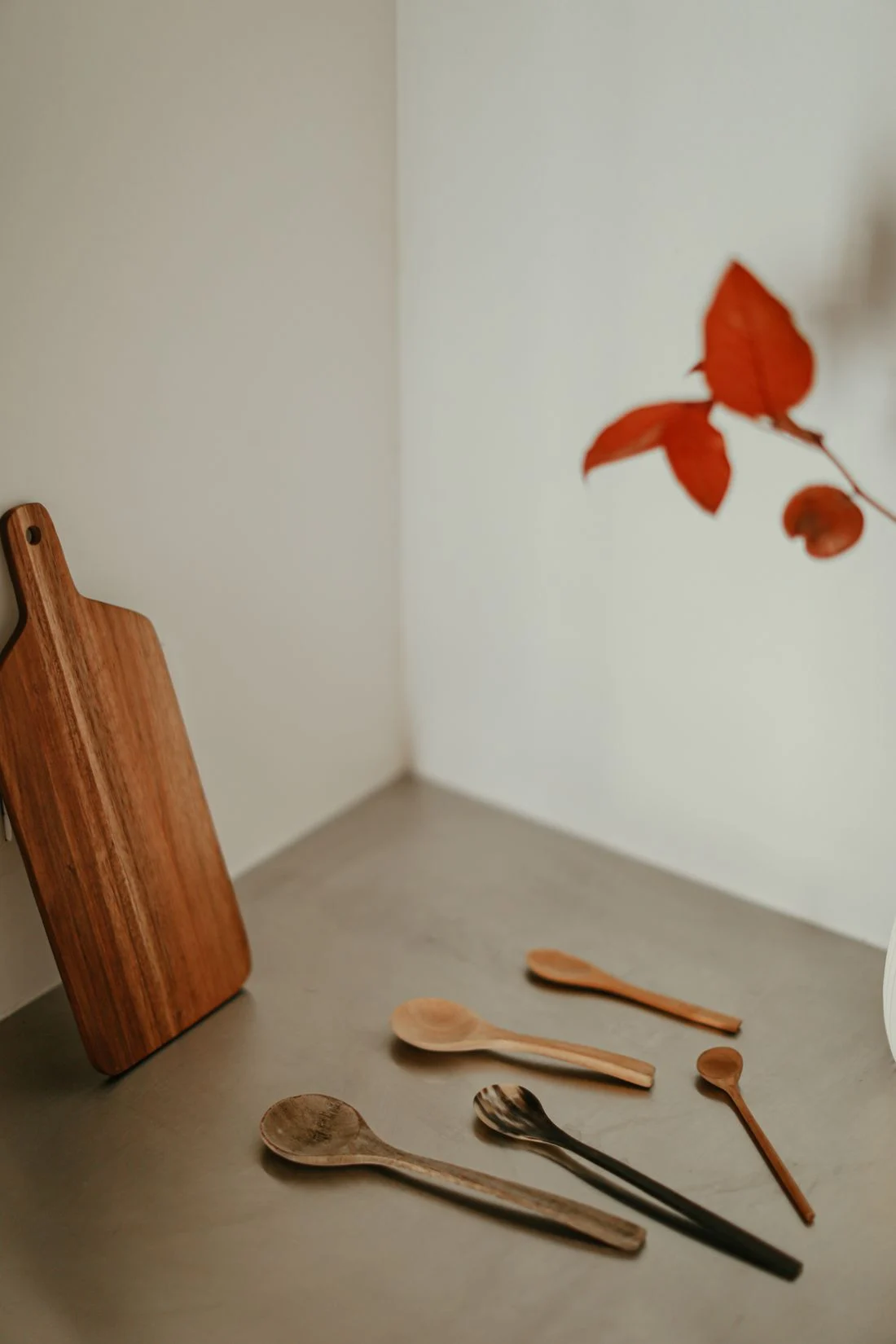 Wooden chopping board and utensils