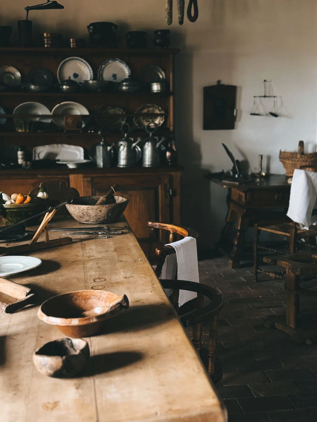 Rustic kitchen shelves with dishes and jars